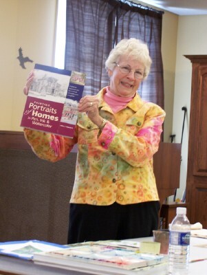 Helen poses with the book she wrote, several years ago,  for North Light Books.